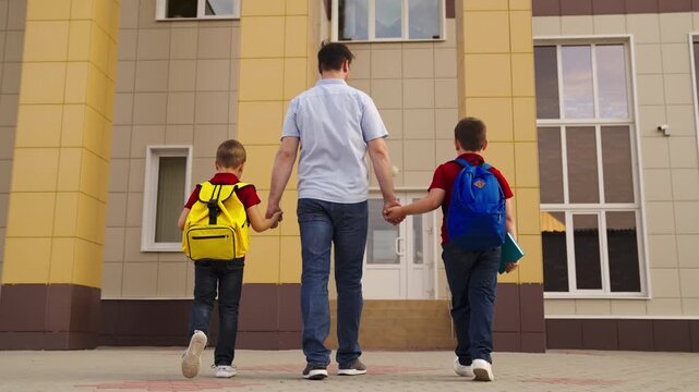Entering a new school year, Boys ready for school, Early morning school walk, Life lessons from dad, Modern education, First steps to knowledge, School entrance scene, Academic routine, Family and