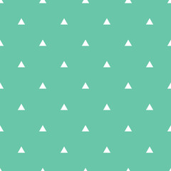 Tile vector pattern with white triangles on mint green background