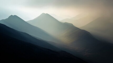 Serene Mountain Landscape with Soft Fog and Dim Light in the Distance Creating a Peaceful Atmosphere for Nature Lovers and Adventurers