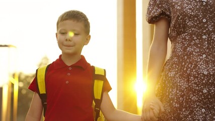 Young Learner’s First Step, Embracing School Life Together, Sun-Kissed Morning Walk, Stepping into School Together, Beginning a Learning Journey, Child’s Anticipation for School, Parent and Child