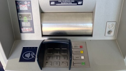 Morning cash withdrawal at an Automated Teller Machine in Germany