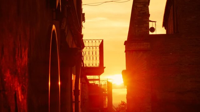 The sun sets in the old town of Tivoli, Lazio, Rome, Italy featuring the Chiesa di San Silvestro or Church of St. Sylvester