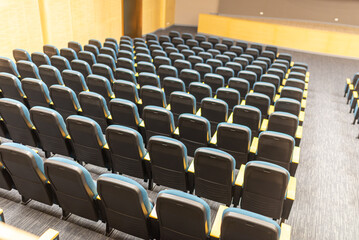 Naklejka premium Empty Conference Room with Black Chairs