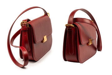 Burgundy shoulder leather bag isolated on white background.