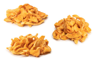 Dried melon slices isolated on a white background.