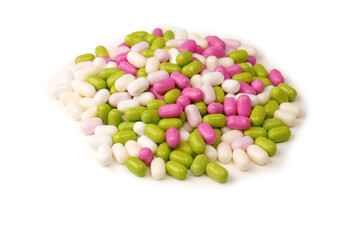 Sweet multicolored candies isolated on white background.