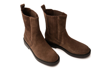 Brown leather boots isolated on white background.
