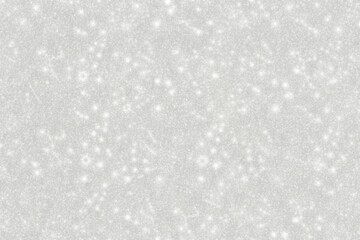 white glitter snowflakes on a snow