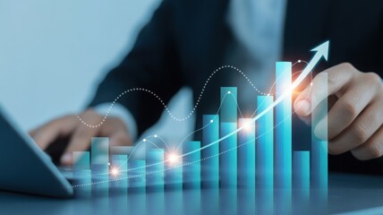 Successful businessperson touching a growing bar graph