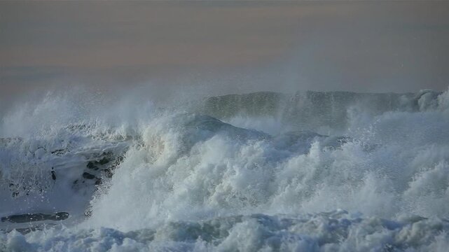 Big waves, foam sea spray. sunshine