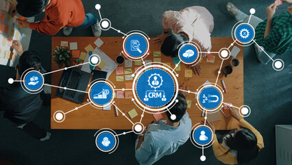 A vibrant collaborative workspace showcasing a team engaged in brainstorming activities with sticky notes and a focus on CRM concepts, fostering creativity and innovation. Amity