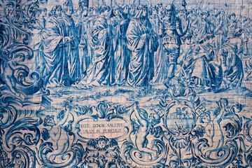Tile panel with scenes catholic on the facade of the Souls Chapel or Santa Catarina, built in the end of the 18th century, Porto, Portugal, 2023