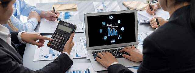 Cost reduction, cost saving concept shown on computer screen brisk, corporate business efficiently...