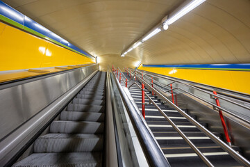 Empty subway station escalator and staircase modern architecture