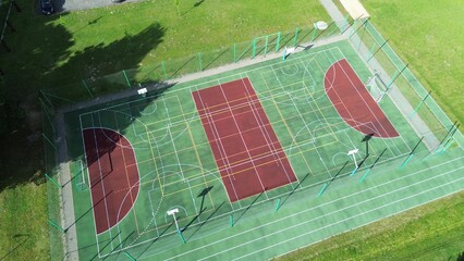 Textured surface of multi-game sport area
