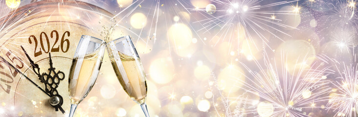 2026 - New Year Celebration With Champagne And Clock - Toast With Flutes - Abstract Defocused Bokeh...