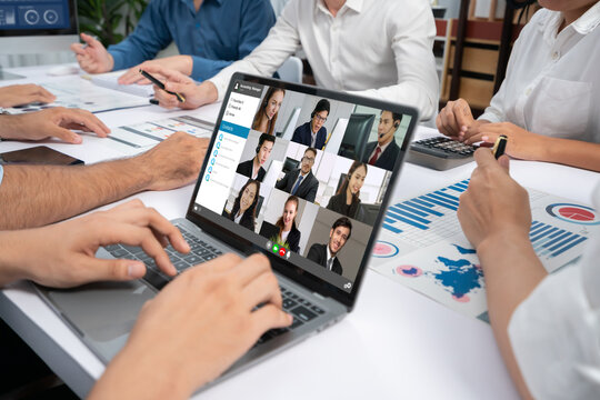 Business people on video conference for brisk virtual group meeting of corprate business office workers - Powered by Adobe