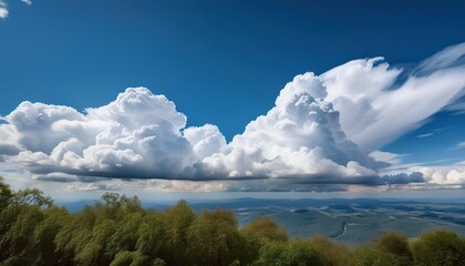 white clouds fill the frame with varying densities against a pale sky backdrop