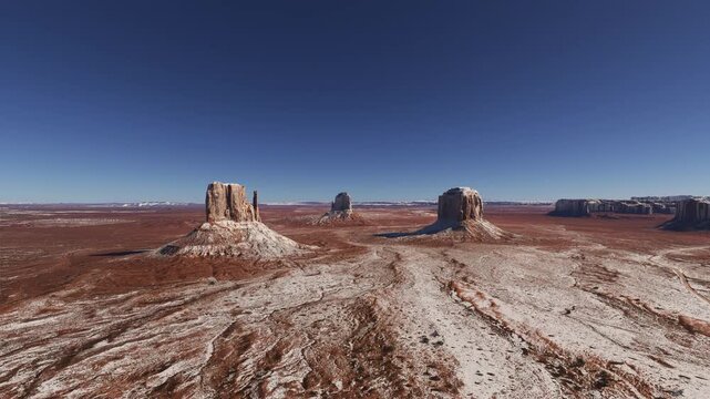 Aerial view of the snow on Sandstone Buttes in Monument Valley Navajo Tribal Park on the Colorado Plateau. Arizona. United States