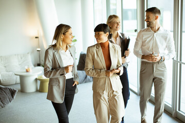 Professional team discussing ideas in a modern office during the day
