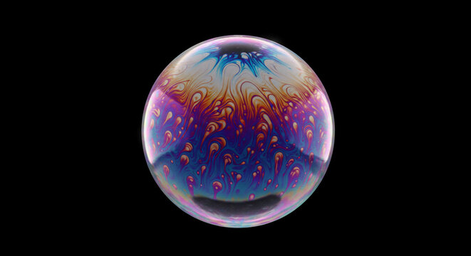Colorful iridescent soap bubble on dark background