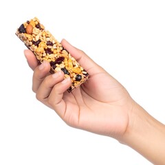 Hand Holding a Granola Bar - Healthy Snack for Energy.
