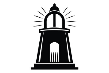 The shining black lighthouse casts long rays of light as it stands tall