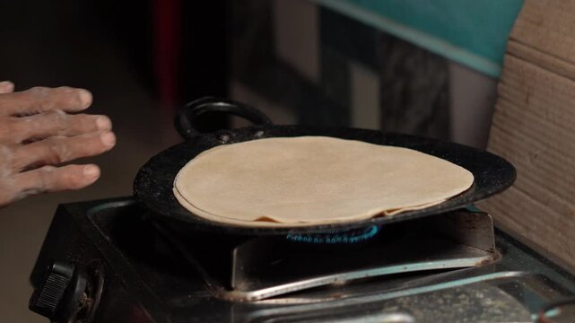 Roti or chapati making in india.