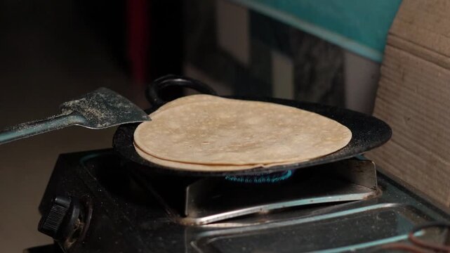 preparing roti for breakfast.