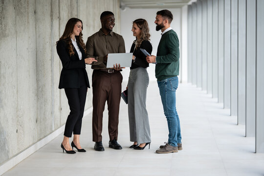 Diverse business team collaborating during office meeting - Powered by Adobe