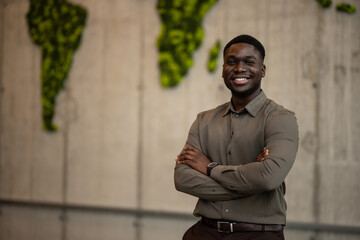 African american businessman smiling confidently in office