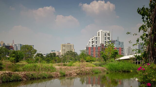 sunny day bangkok city center famous park garden river skywalk top panorama 4k timelapse thailand