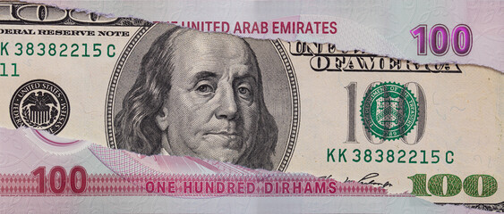 Torn UAE One Hundred Dirham Banknote Revealing US One Hundred Dollar Bill