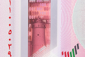 Extreme Macro Detail of New Polymer One Hundred UAE Dirham Banknote Showing Holographic Security Window and Denomination
