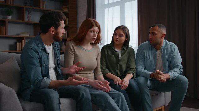 Depressed woman talking crying feeling trouble worry four friends support multiracial people men women together supporting group psychological therapy at home party diverse buddies communicate advice