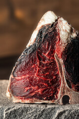 Raw dry aged T-bone steak as a premium beef cut
Dry aged porterhouse steak presented as high...