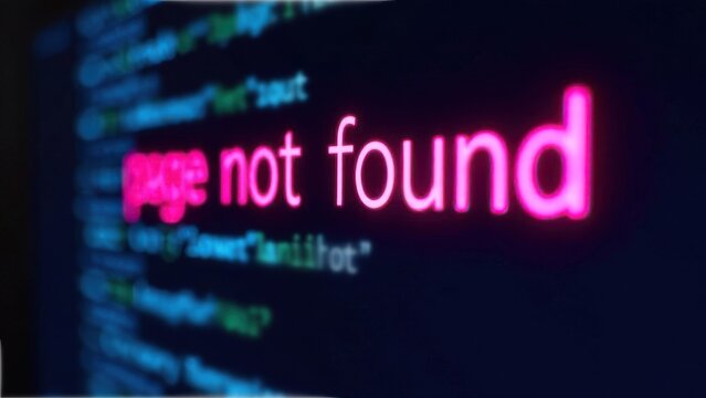 Close-up view of a digital screen showing a vibrant error message stating page not found, with blurred code in the background, creating a tech-focused atmosphere and highlighting digital issues