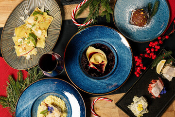 Gourmet assortment of fine dining dishes on elegant plates
Restaurant food selection presented as upscale cuisine
Assorted gourmet dishes showcased as a refined tasting spread