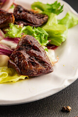 Salad heart turkey roasted giblets poultry meat tasty snack fresh delicious gourmet food table setting rustic food top view copy space