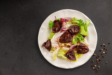 Salad heart turkey roasted giblets poultry meat tasty snack fresh delicious gourmet food table setting rustic food top view copy space