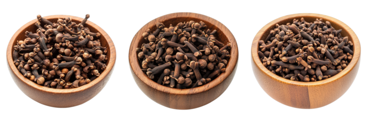 Three wooden bowls filled with aromatic cloves, a close-up shot that captures the warm tones of the spice