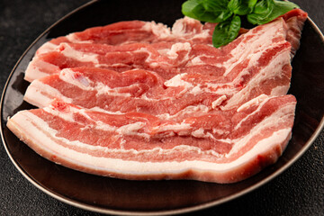 Bacon slice lard with meat slices pieces pork tenderloin portion size natural product tasty snack fresh delicious gourmet food background on the table rustic top view copy space