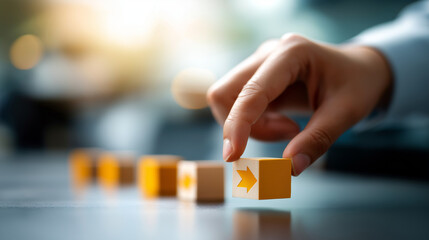 Hand selecting block with directional arrow defocused decision background path leads to successful choice strategic selection scene business direction visualization with copy
