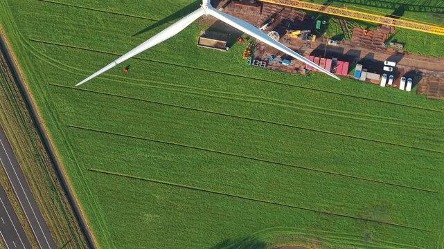 Aerial View of Wind Turbine Construction with Crane