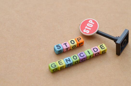 Stop Genocide: Miniature Sign and Letter Beads Deliver an Urgent, Toy-Like Humanitarian Plea Against Mass Violence. - Powered by Adobe