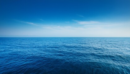 Obraz premium serene ocean horizon tranquil blue water meets hazy sky perfect summer travel and nature background