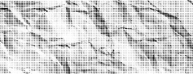 Halftone paper background with rough crumpled texture. Grunge vintage note sheet or package. Abstract simple black and white newspaper. Noise or grain effect. Pattern backdrop