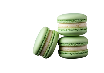 Elegant Light Green Macarons: Three Delicate French Pastries with Creamy White Filling, Showcasing Perfect Shells and Ruffled Feet Against a Dramatic Black Background, Capturing the Artistry of Confec