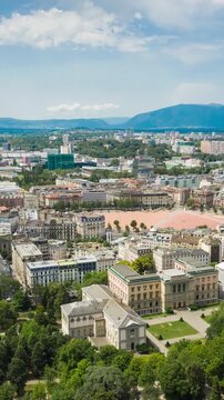 sunny day flight over geneva city plainpalais area square aerial vertical panorama 4k timelapse switzerland