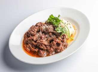 Braised beef cheek ragu with mashed potatoes, perfect for upscale dining or comforting meals. Delicious, flavorful, and professionally styled.